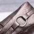 high-angle-view-leather-bag-table
